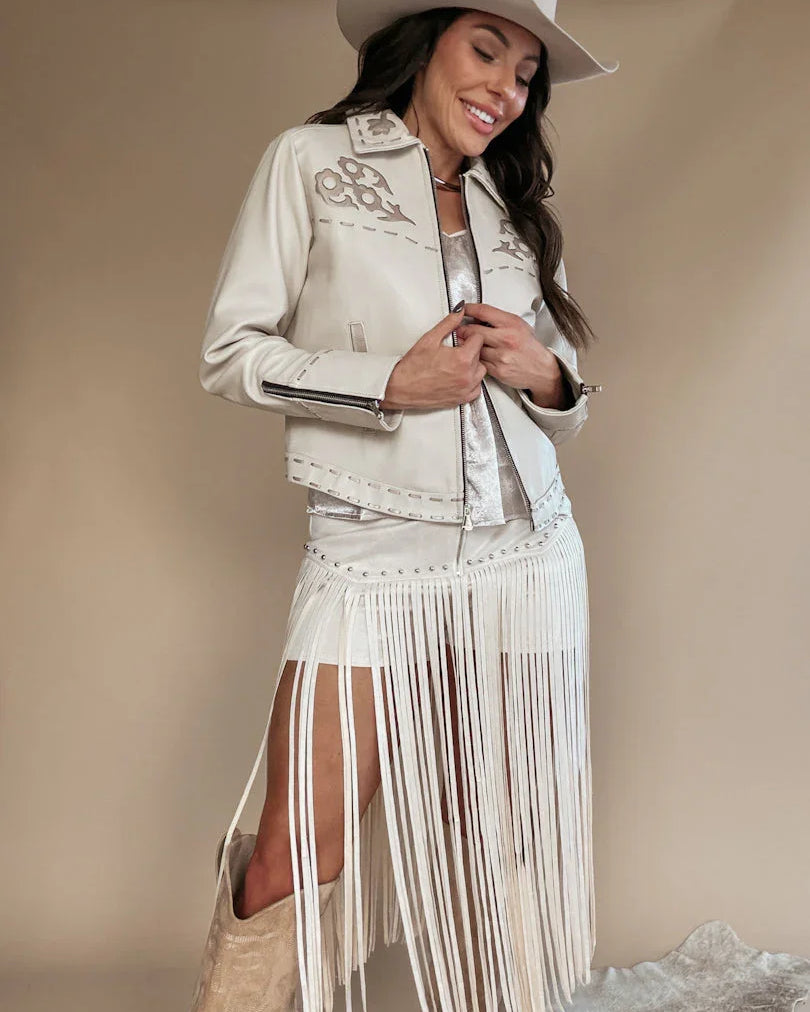 Thunderbird pendant chain necklace displayed on wooden slab with serape fabric underneath - The Wild J