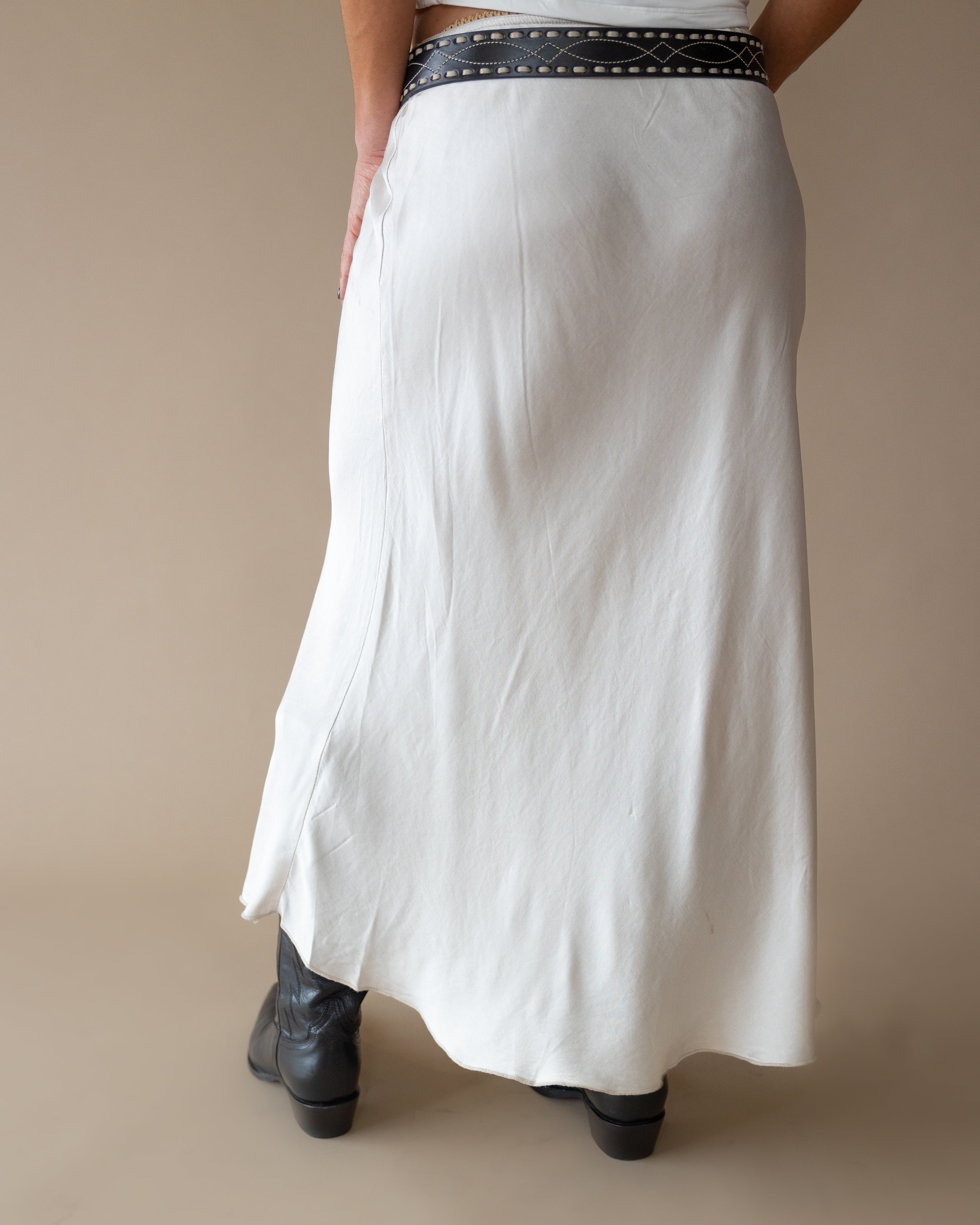 White western maxi skirt with black studded belt and black cowgirl boots