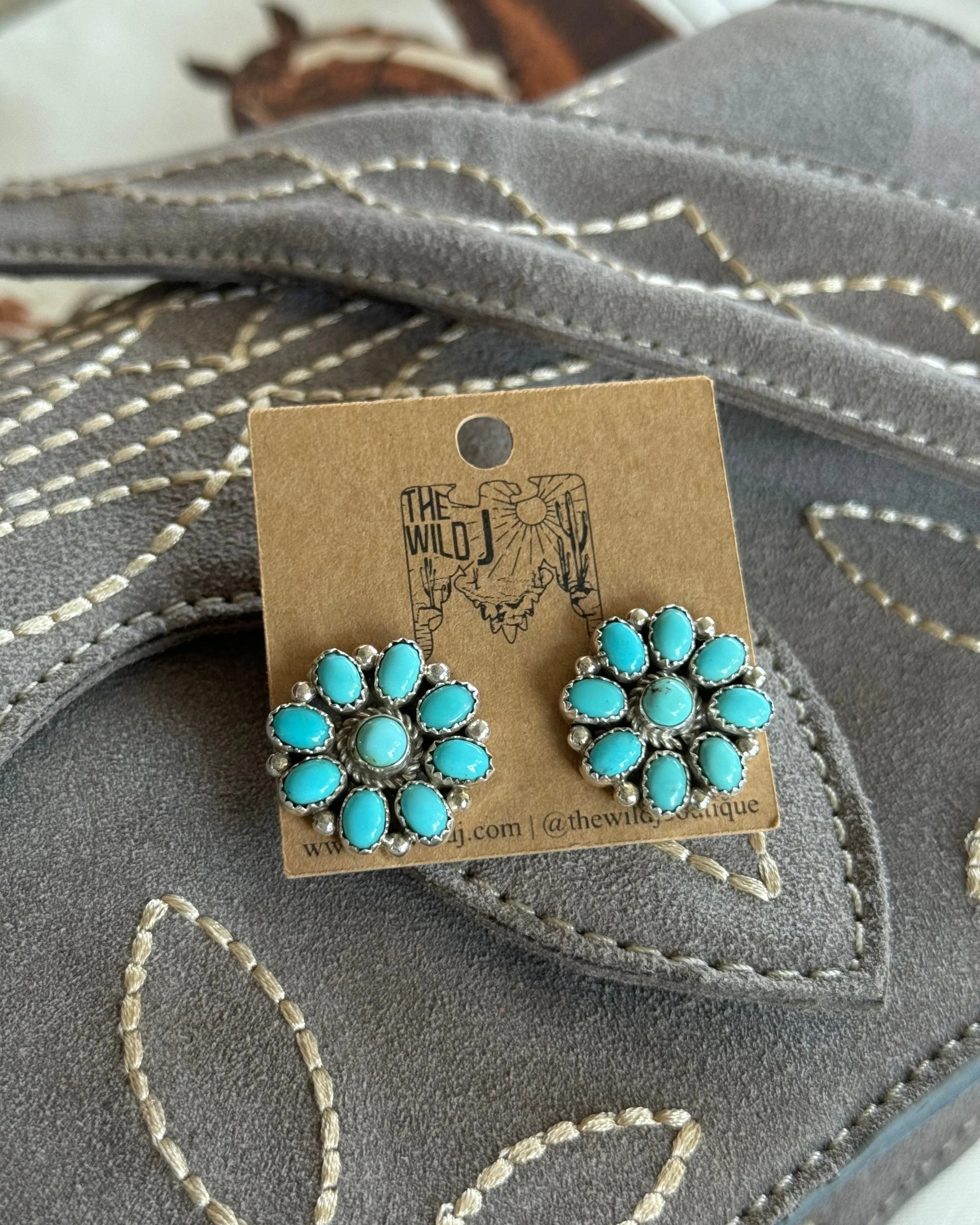 Turquoise concho stud earrings on suede embroidered western purse
