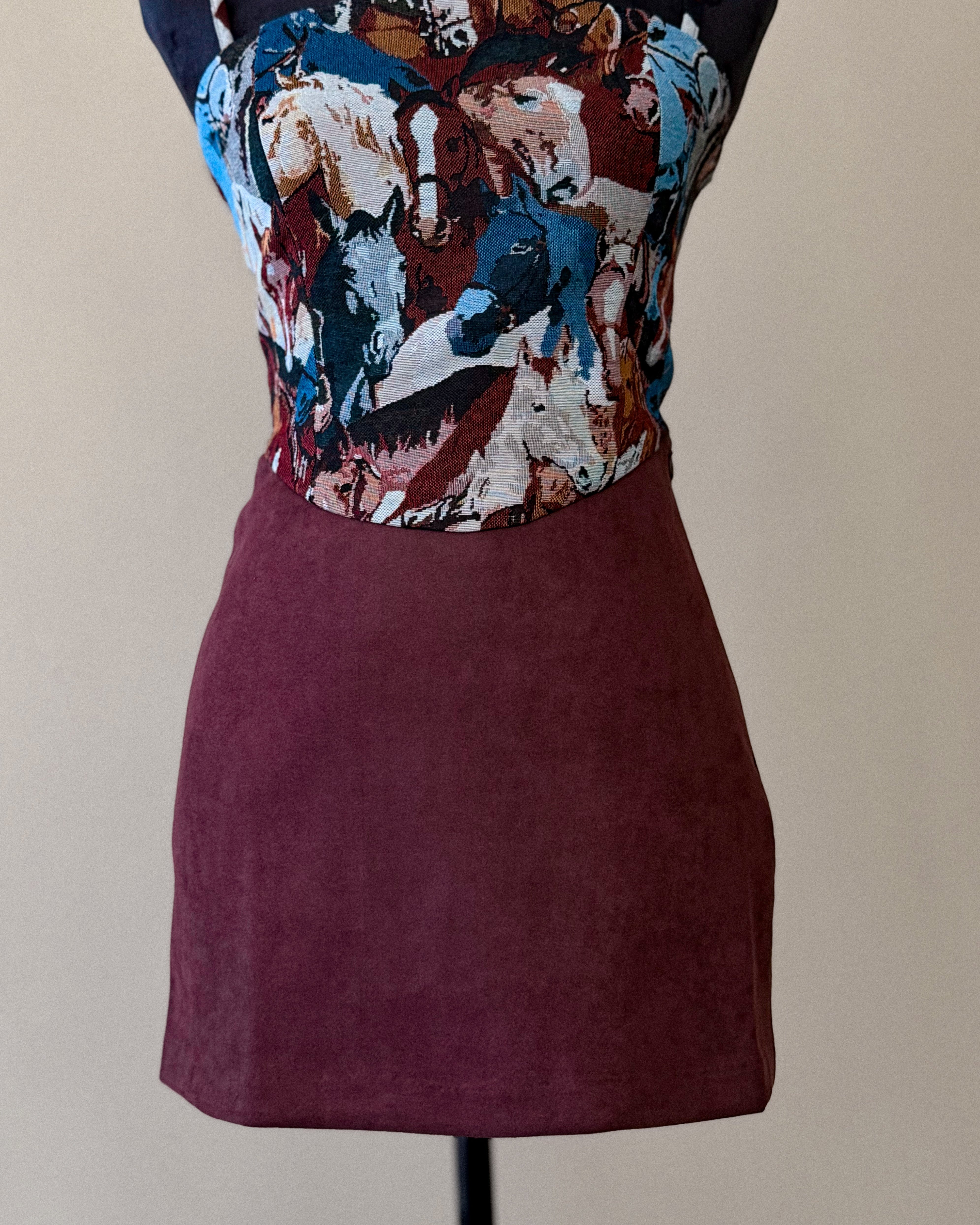 Western boho mini dress with colorful horse print top and burgundy suede skirt