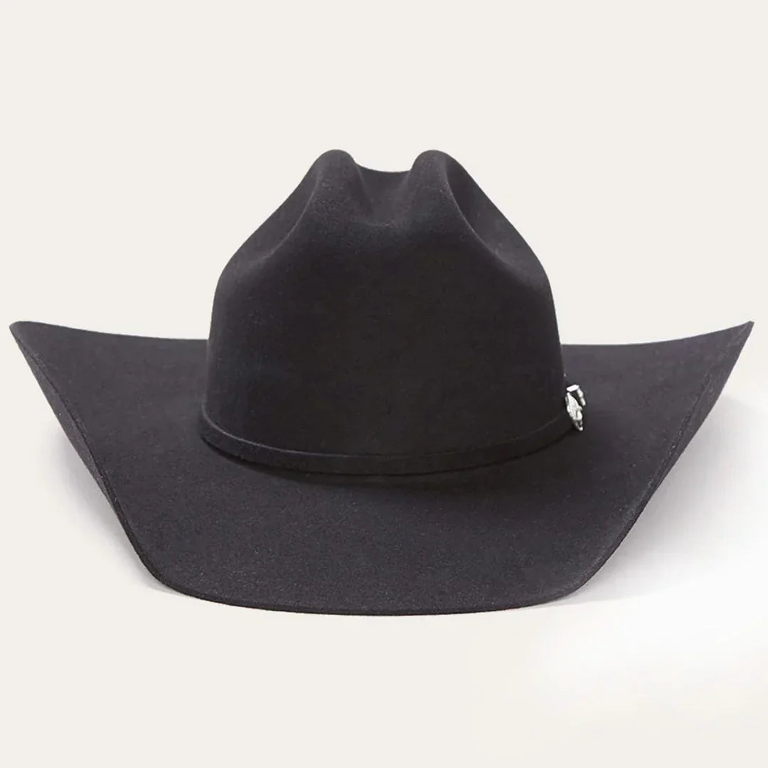 Black cowgirl hat with wide brim and decorative silver accent, classic western style