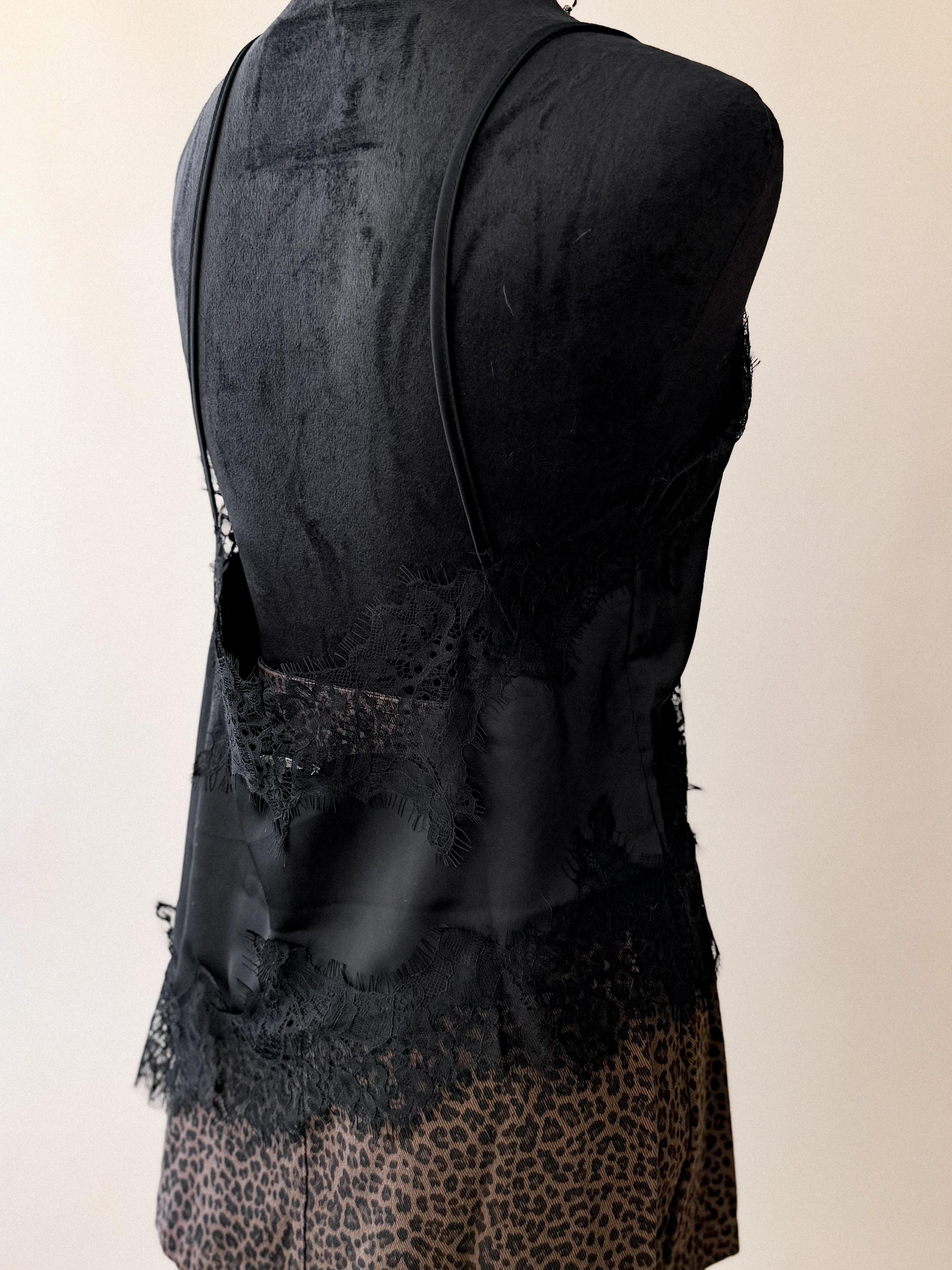 Black lace trim camisole top with spaghetti straps and leopard print skirt on mannequin