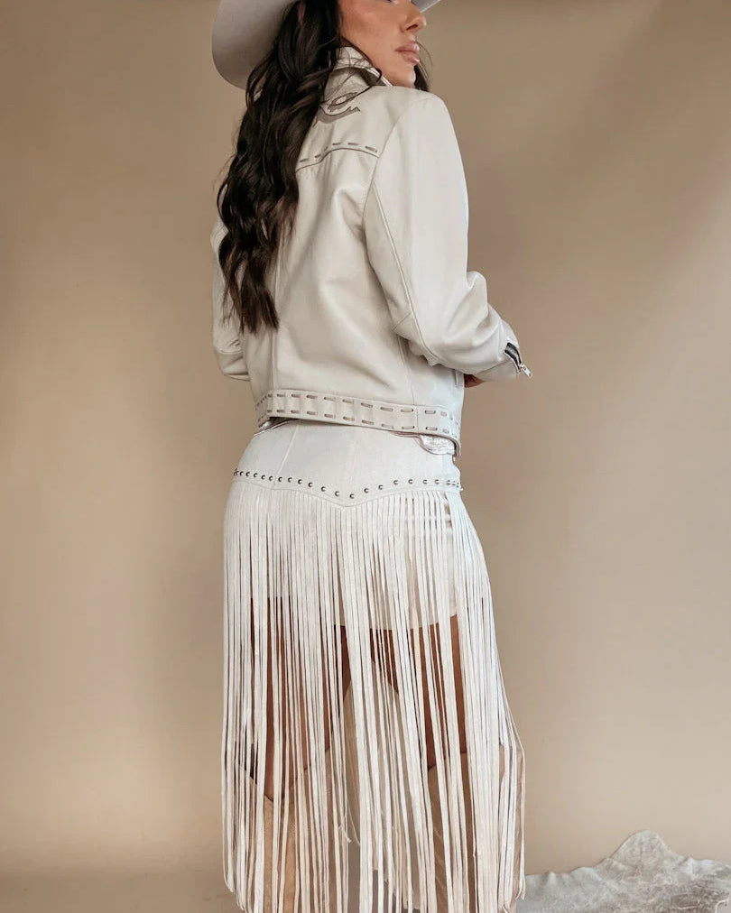 Thunderbird pendant chain necklace displayed on wooden slab with serape fabric underneath - The Wild J