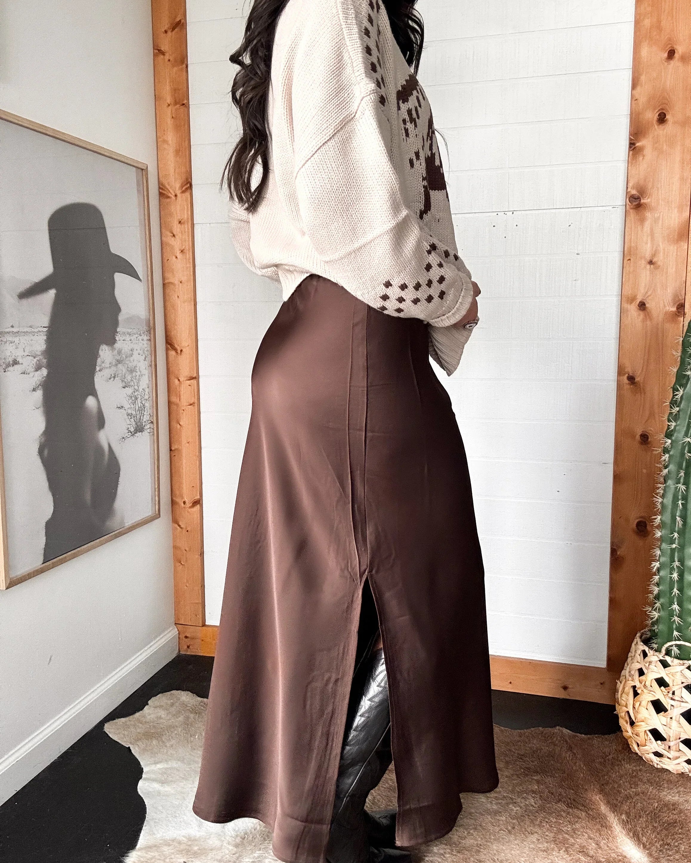 Satin maxi skirt showing side slit detail