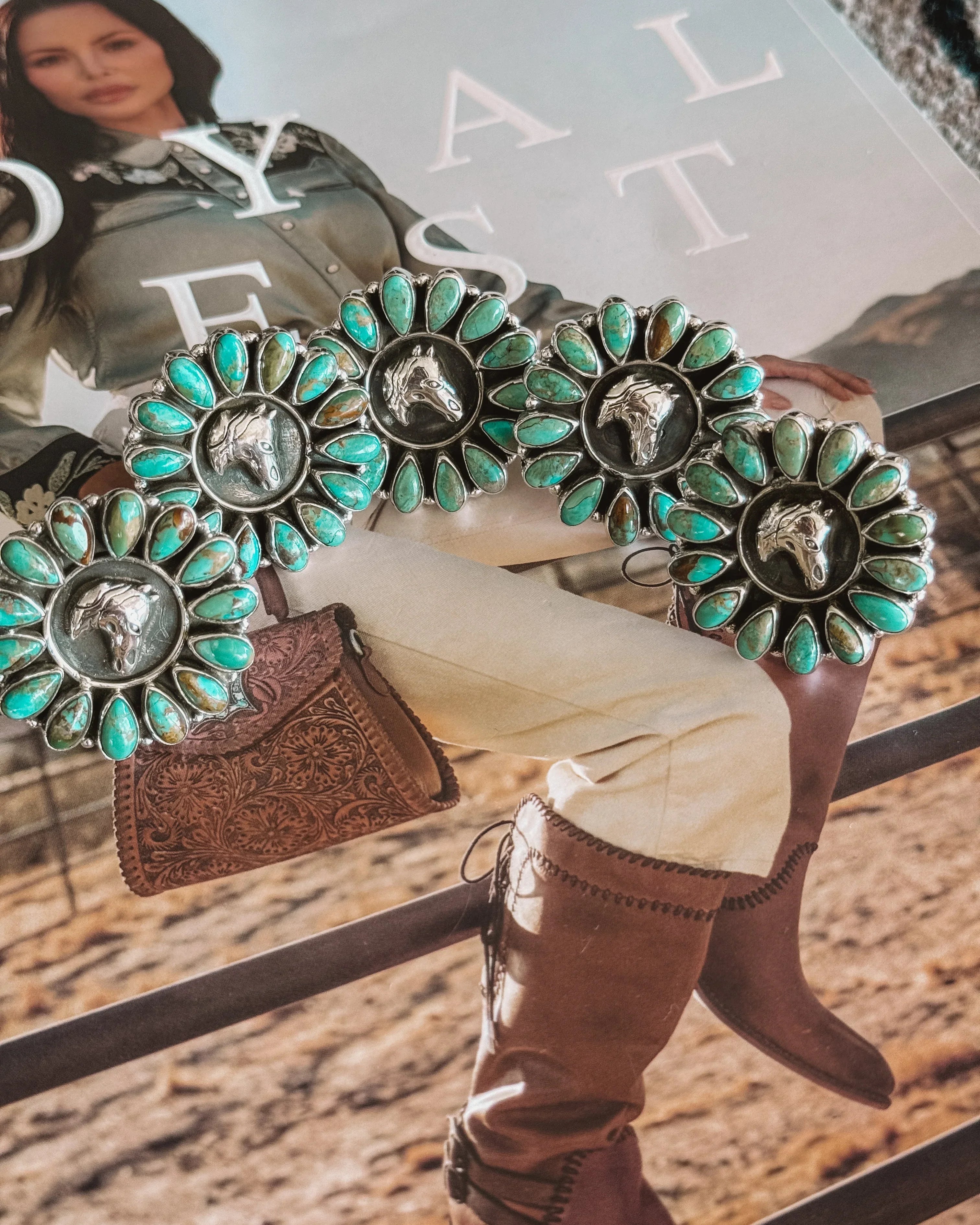 Sterling silver horse rings with turquoise stones in a western boho style setting.