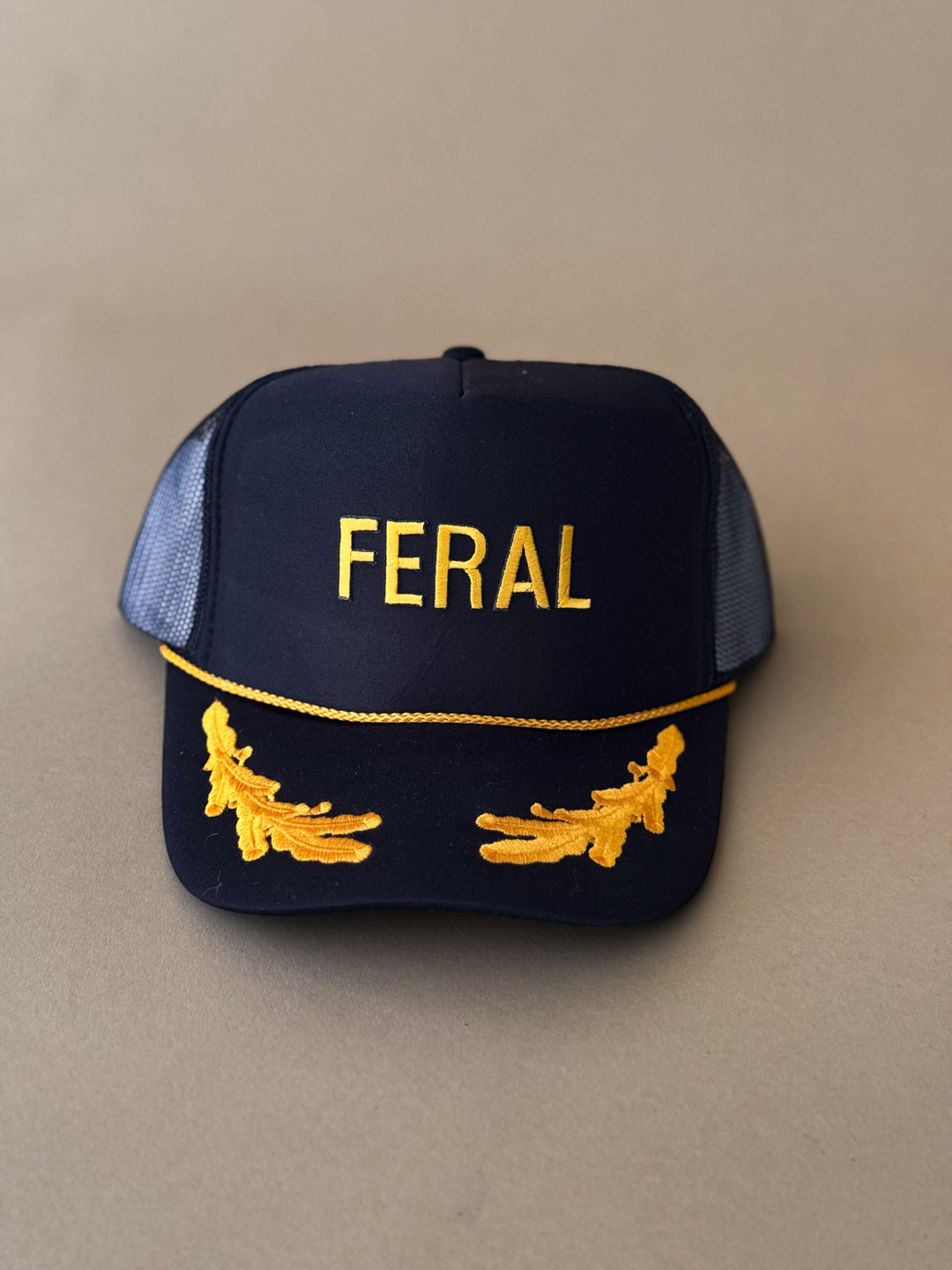 Feral Trucker Hat – Black & Gold