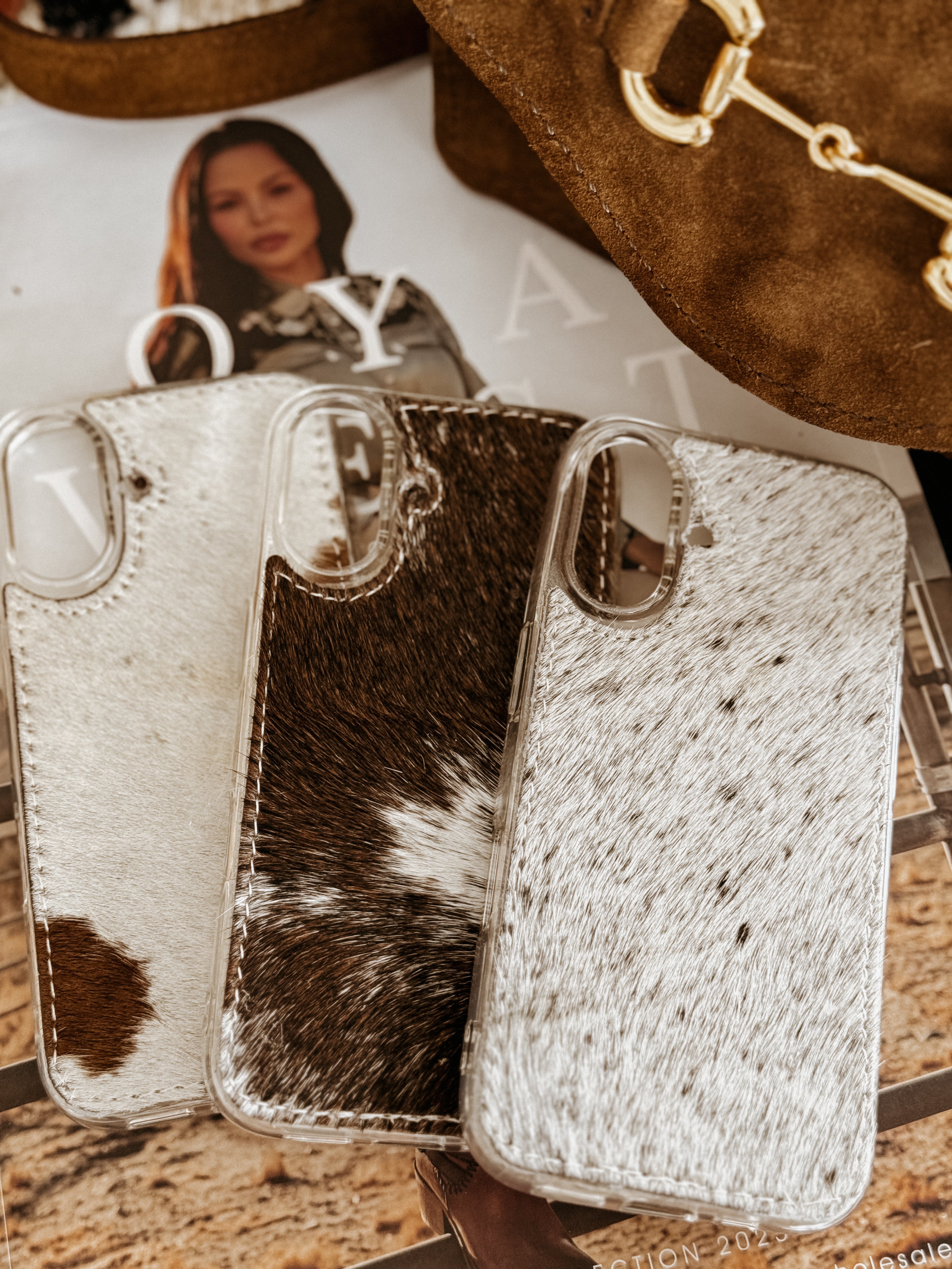 Thunderbird pendant chain necklace displayed on wooden slab with serape fabric underneath - The Wild J