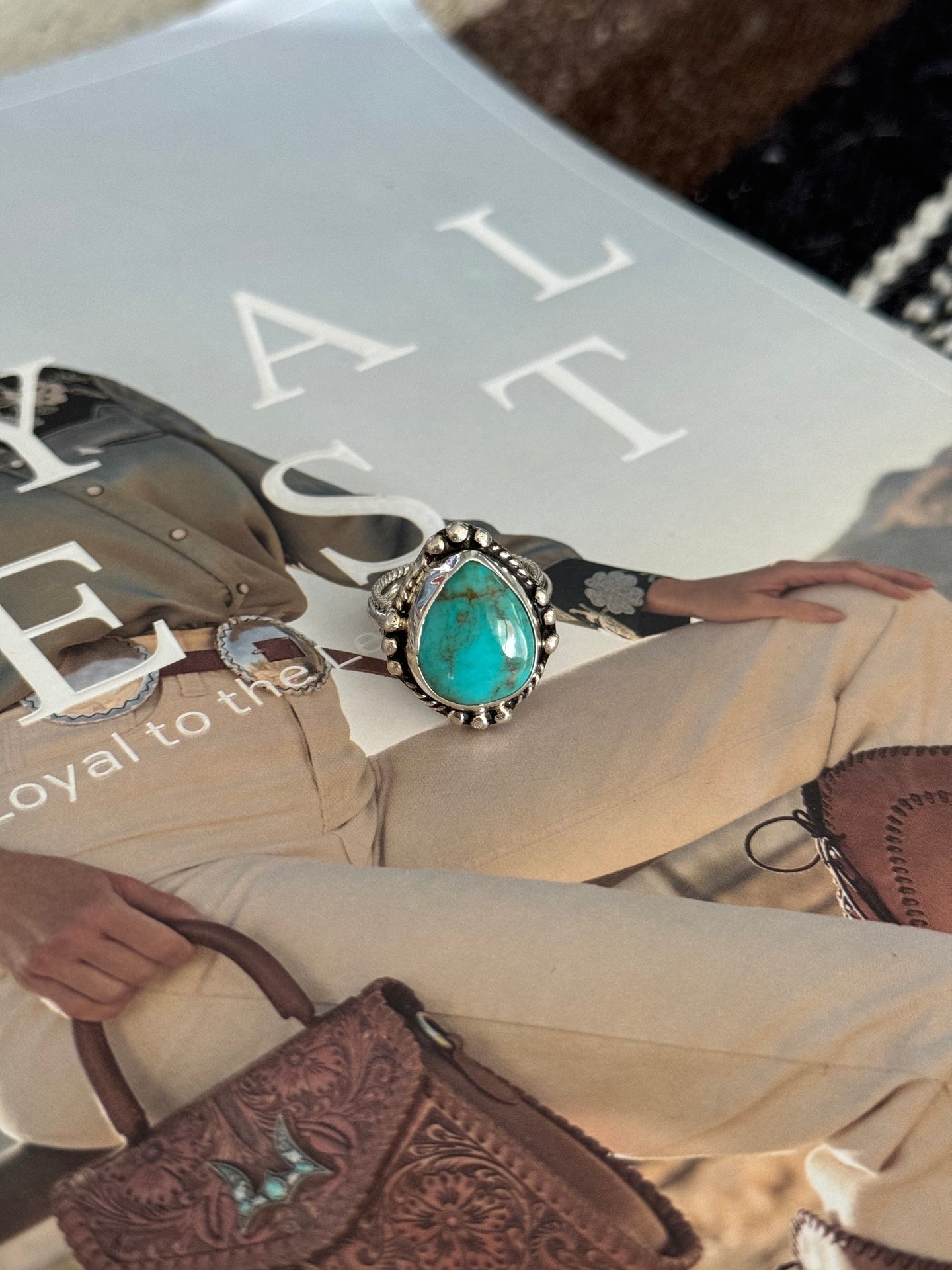 Handmade Navajo sterling silver teardrop turquoise ring size 5 with authentic turquoise stone.