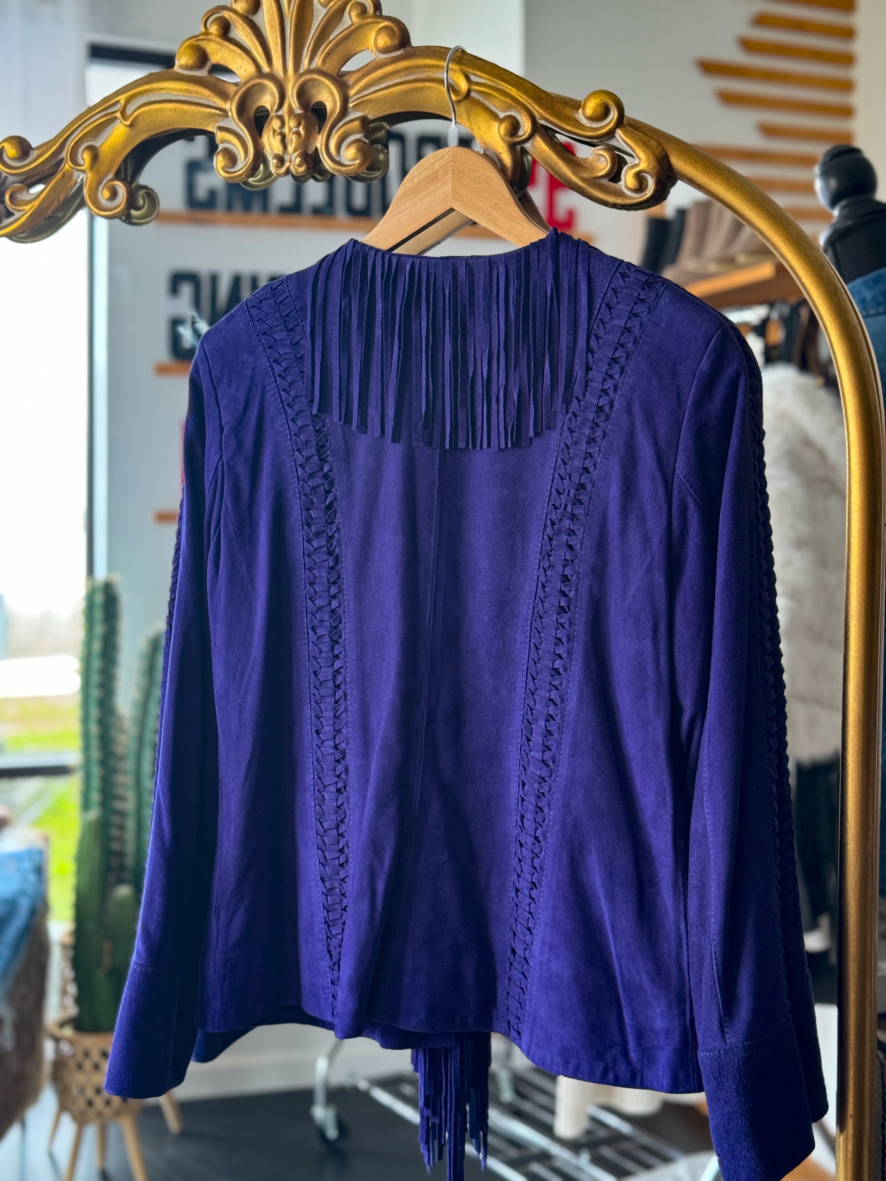 Purple suede western fringe jacket with braided details on hanger, boho boutique style