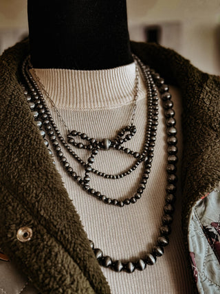 The Layered Pearl & Bow Necklace