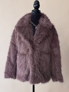 Plum faux fur western jacket with wide collar on mannequin, cozy boho outerwear