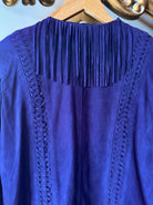 Purple suede western jacket with fringe detail and braided trim on hanger