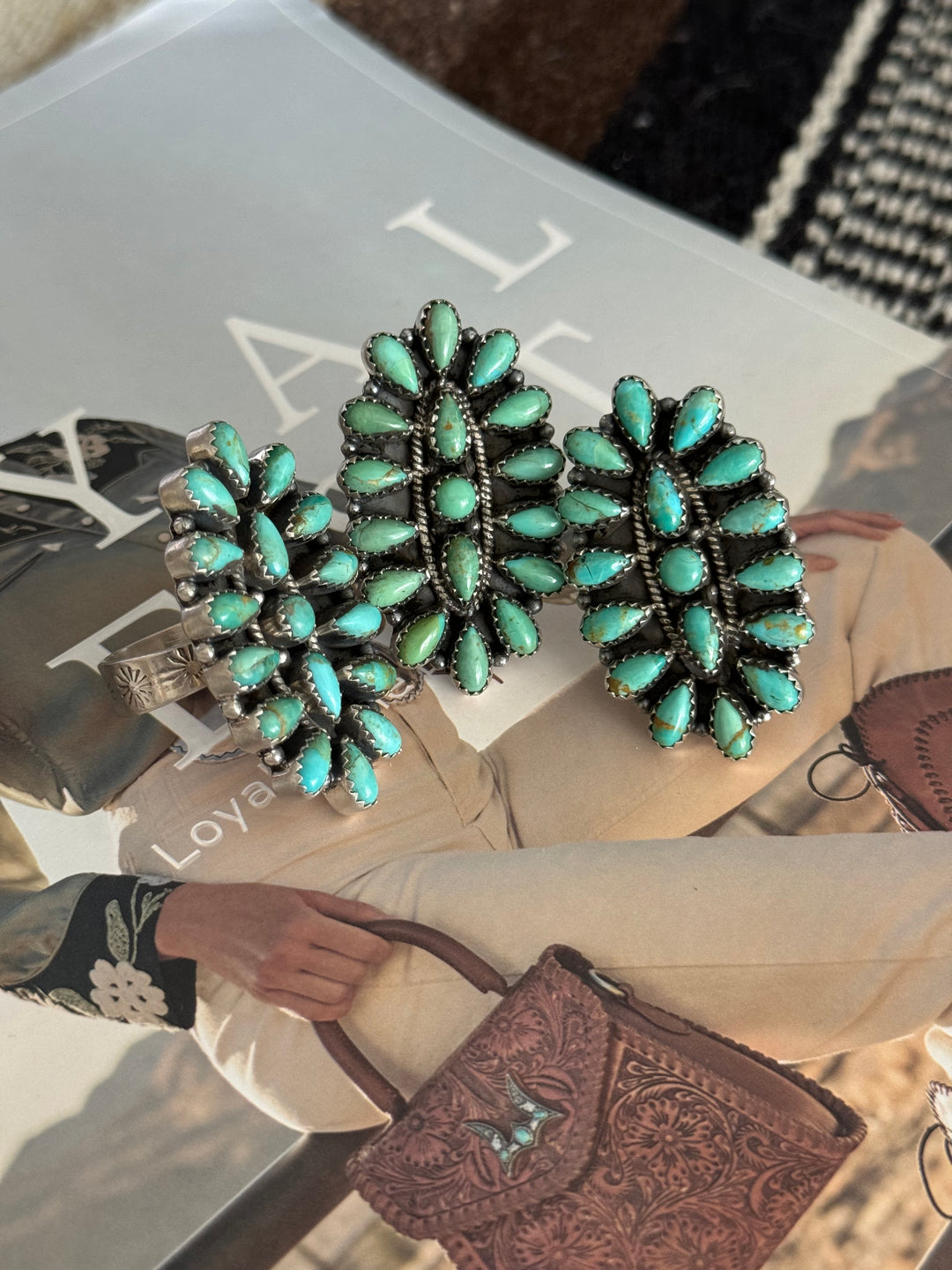 Close-up of handmade Kingman turquoise ring signed Nizhoni in sterling silver