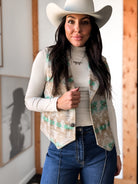 Thunderbird pendant chain necklace displayed on wooden slab with serape fabric underneath - The Wild J