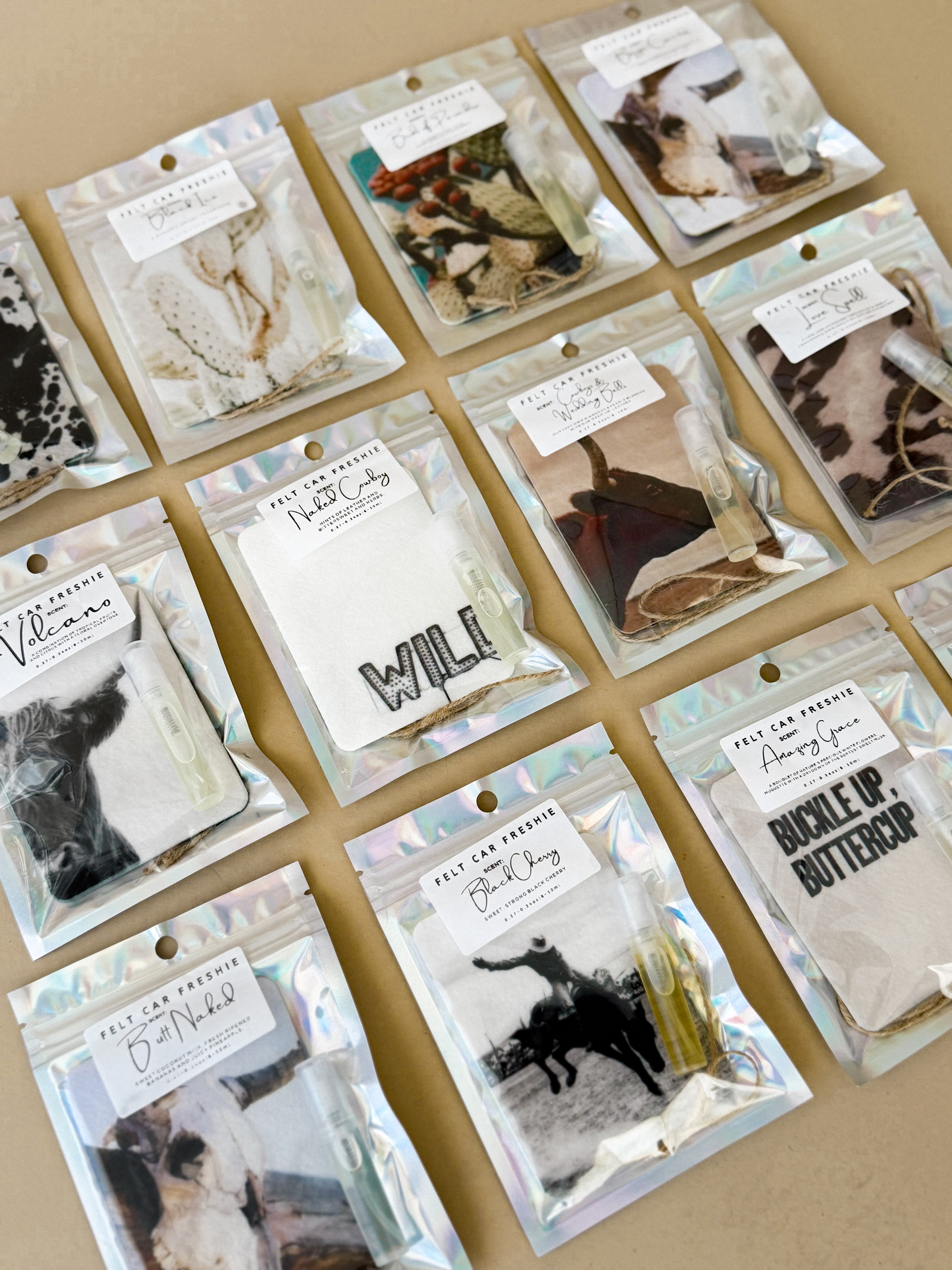 Thunderbird pendant chain necklace displayed on wooden slab with serape fabric underneath - The Wild J