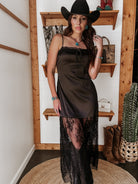 Thunderbird pendant chain necklace displayed on wooden slab with serape fabric underneath - The Wild J