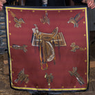 Western boho scarf with cowboy saddle illustrations and ranch-inspired design on burgundy fabric.