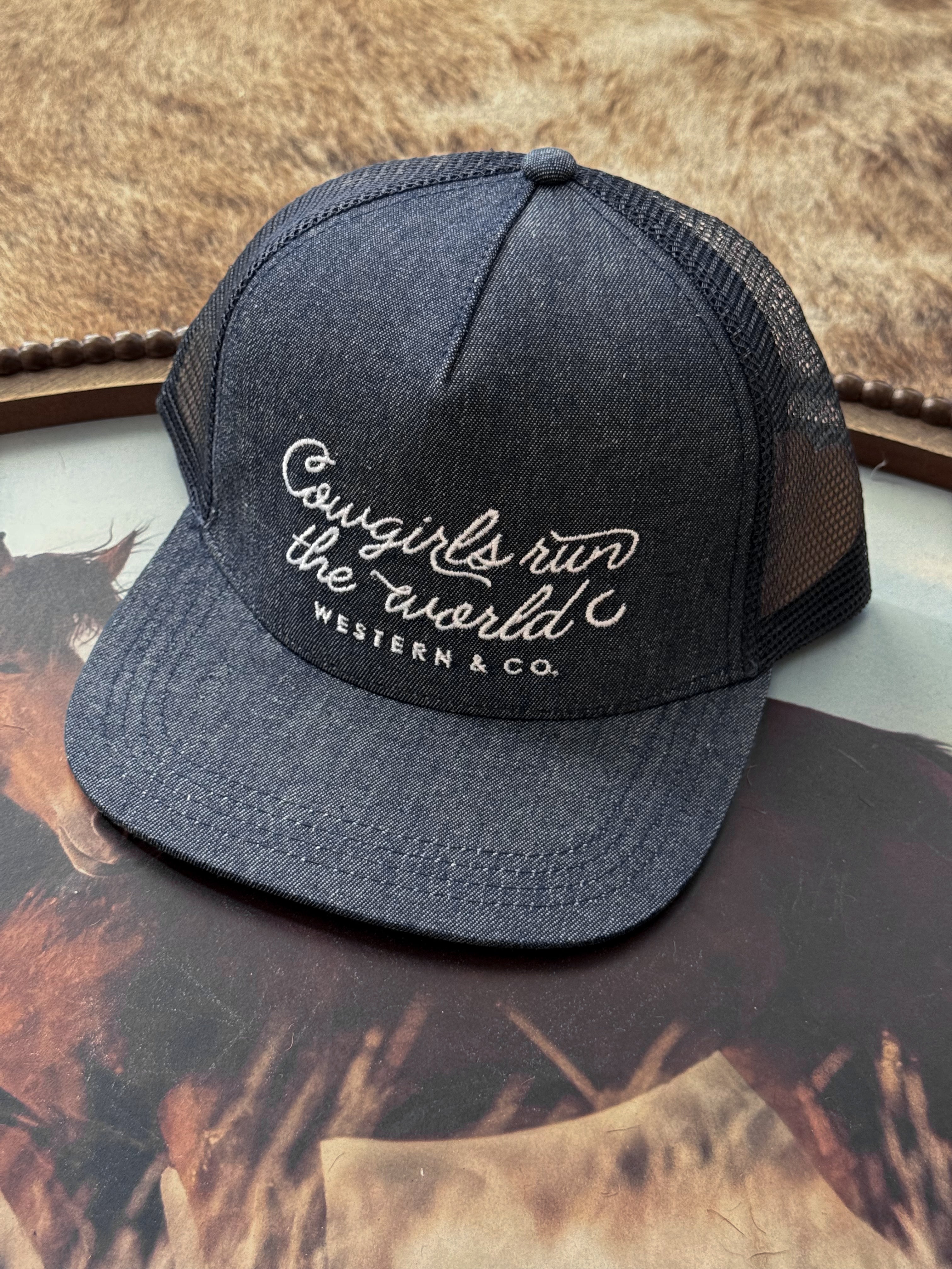 Black mesh trucker hat with 'Cowgirls run the world' embroidered, western boho style
