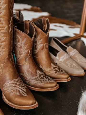 Lane flame stitch ankle bootie with snip toe and turquoise sole