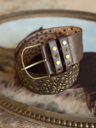 Thunderbird pendant chain necklace displayed on wooden slab with serape fabric underneath - The Wild J