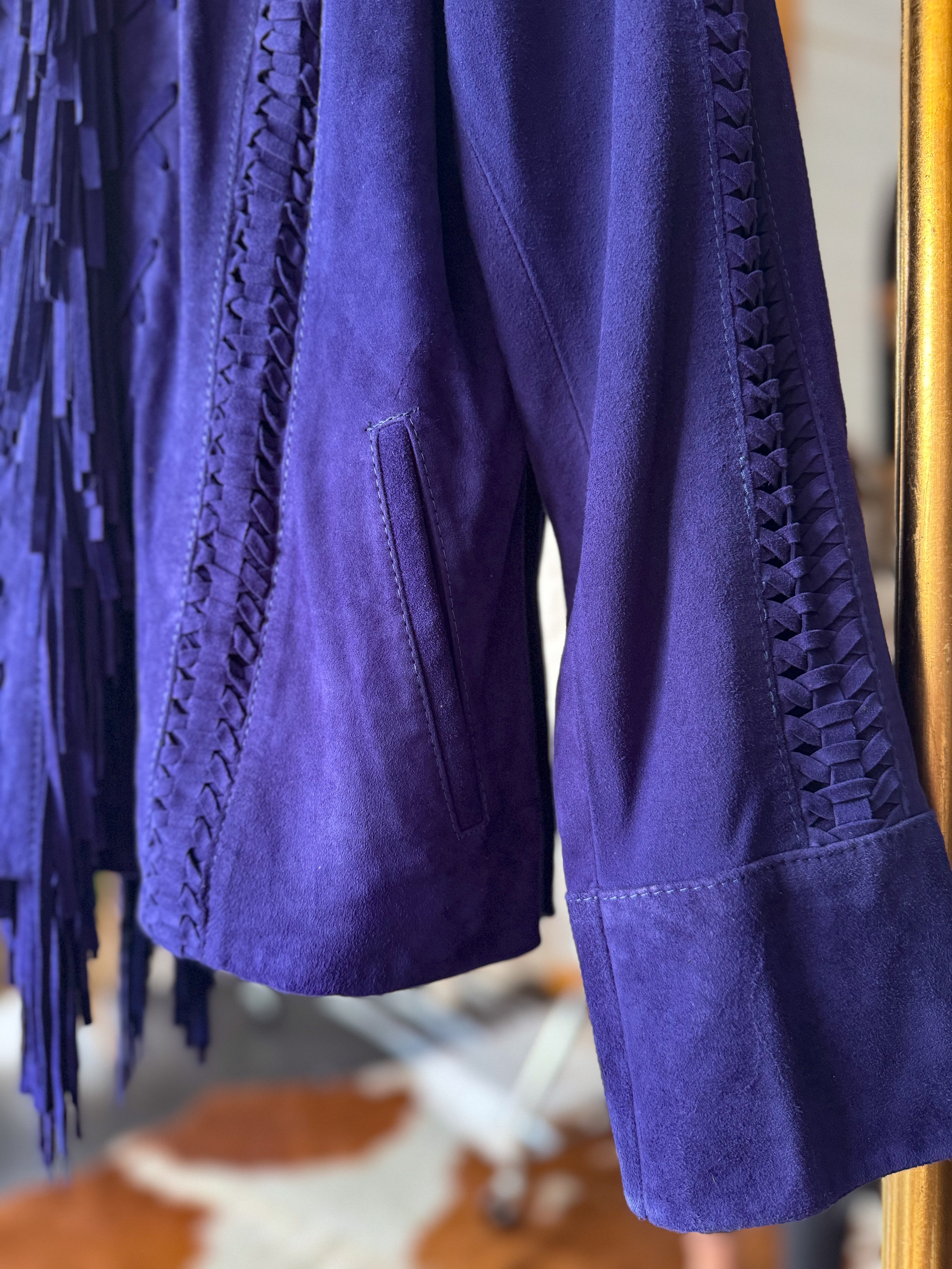 Purple suede western jacket with fringe and braided trim details, boho cowgirl style