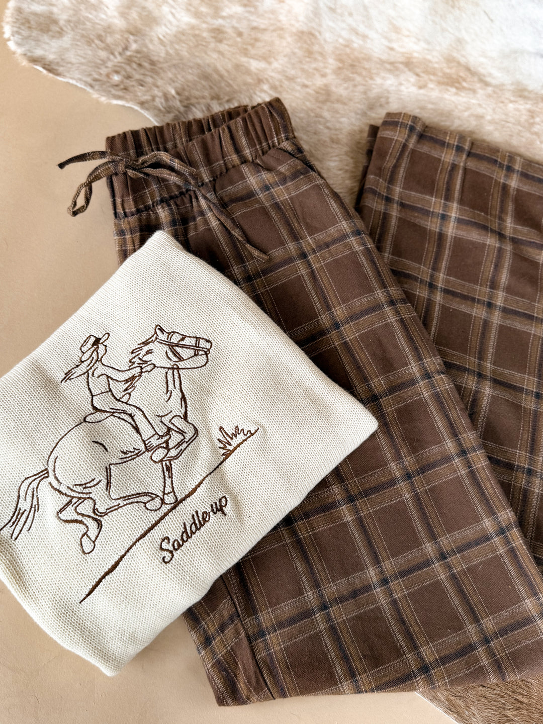 Suéter bordado Saddle Up