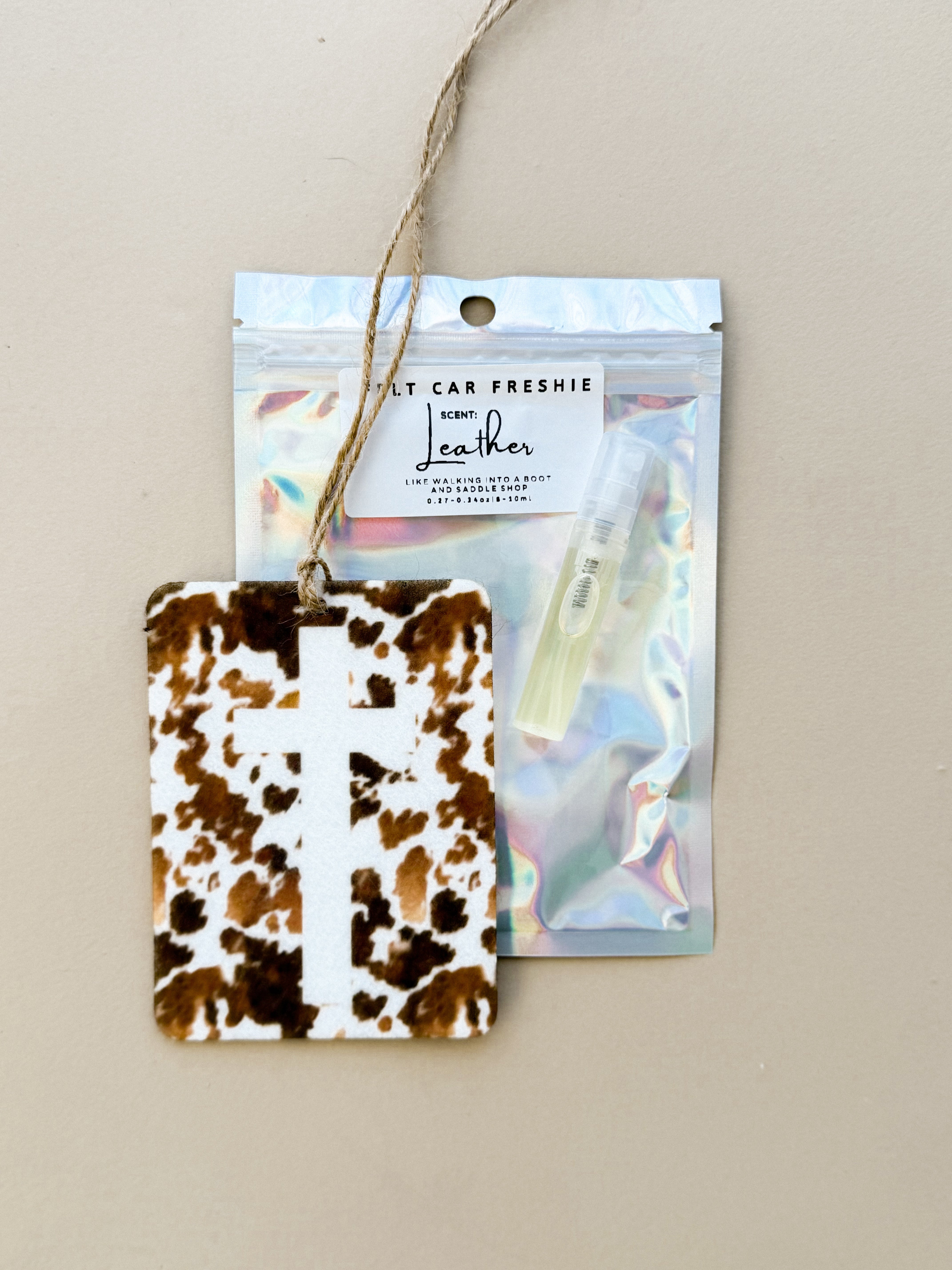 Thunderbird pendant chain necklace displayed on wooden slab with serape fabric underneath - The Wild J