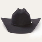 Black cowgirl hat with wide brim and decorative silver accent, classic western style