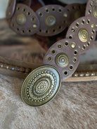 Thunderbird pendant chain necklace displayed on wooden slab with serape fabric underneath - The Wild J