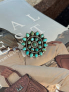 Western turquoise cluster ring with silver detailing in boho cowgirl jewelry style