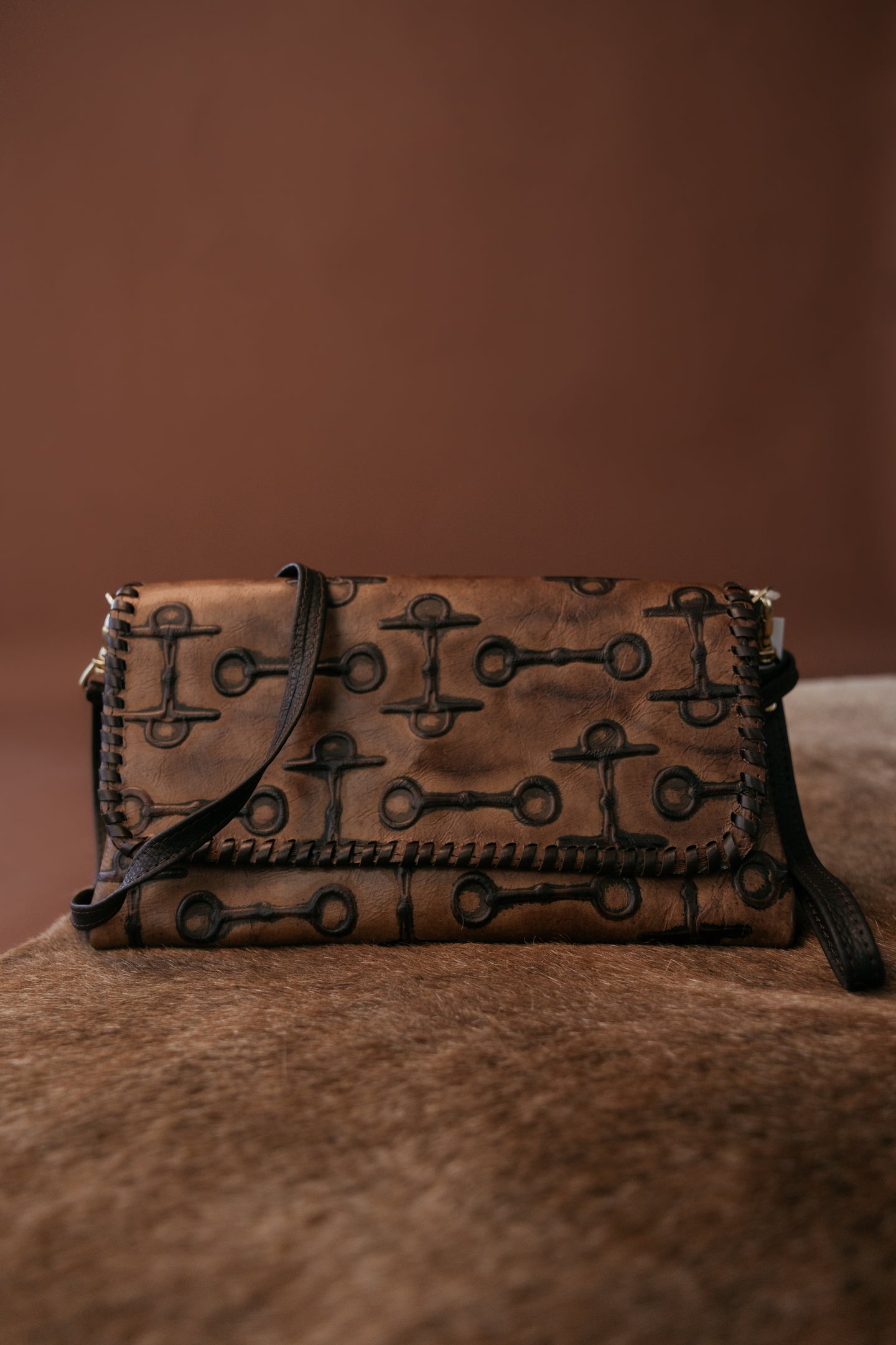 Double J Saddlery brown western clutch with horsebit embossing