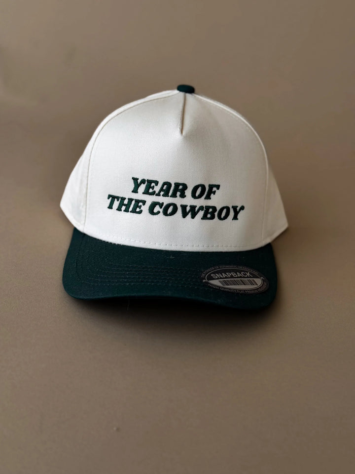 White and green snapback hat with &