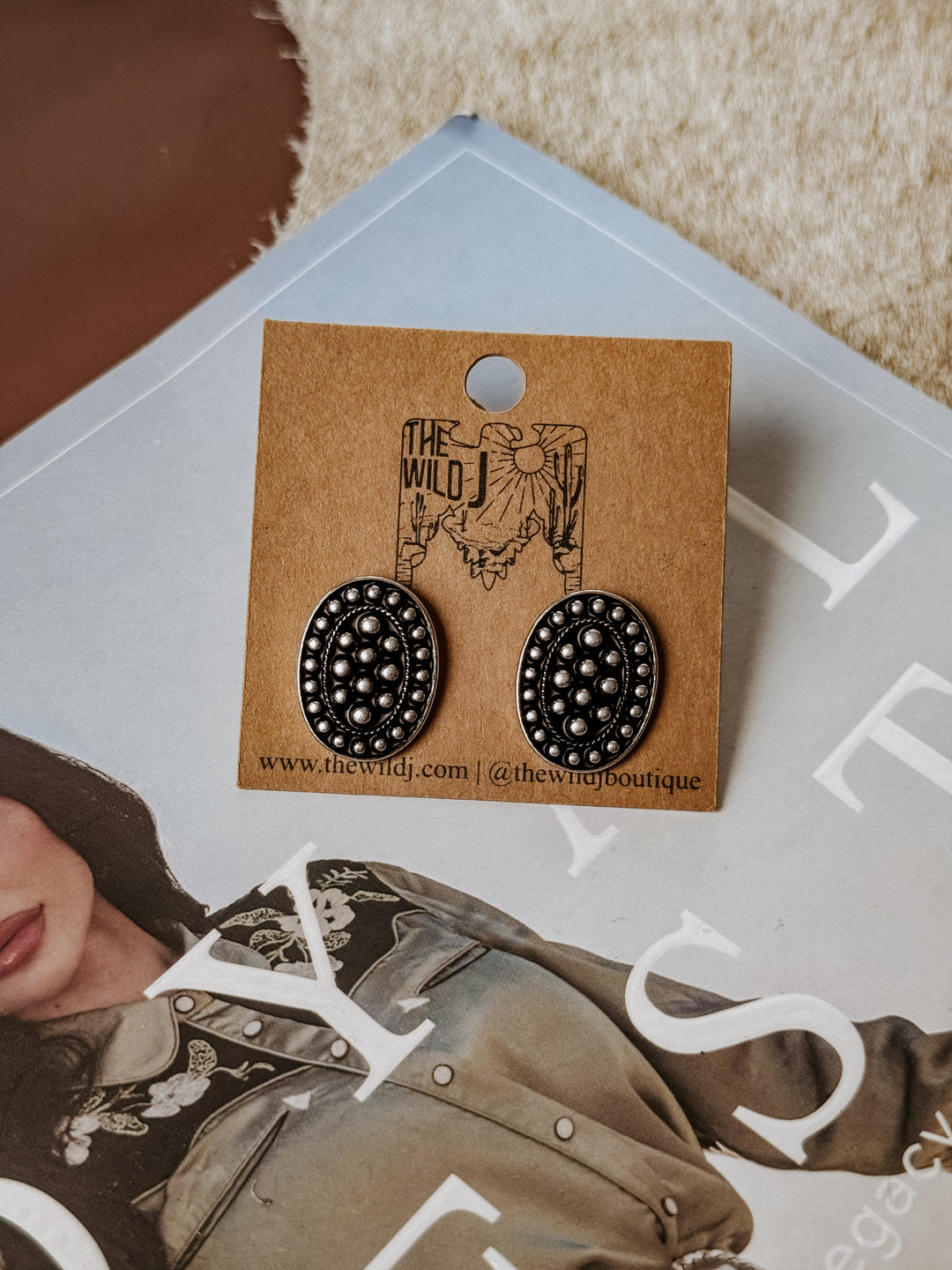 Burnished silver oval stud earrings featuring bubble detailing, a post-back closure, and a lightweight, nickel-free design.