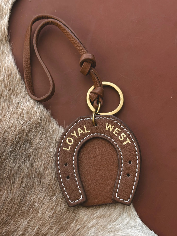 Brown leather keychain with &