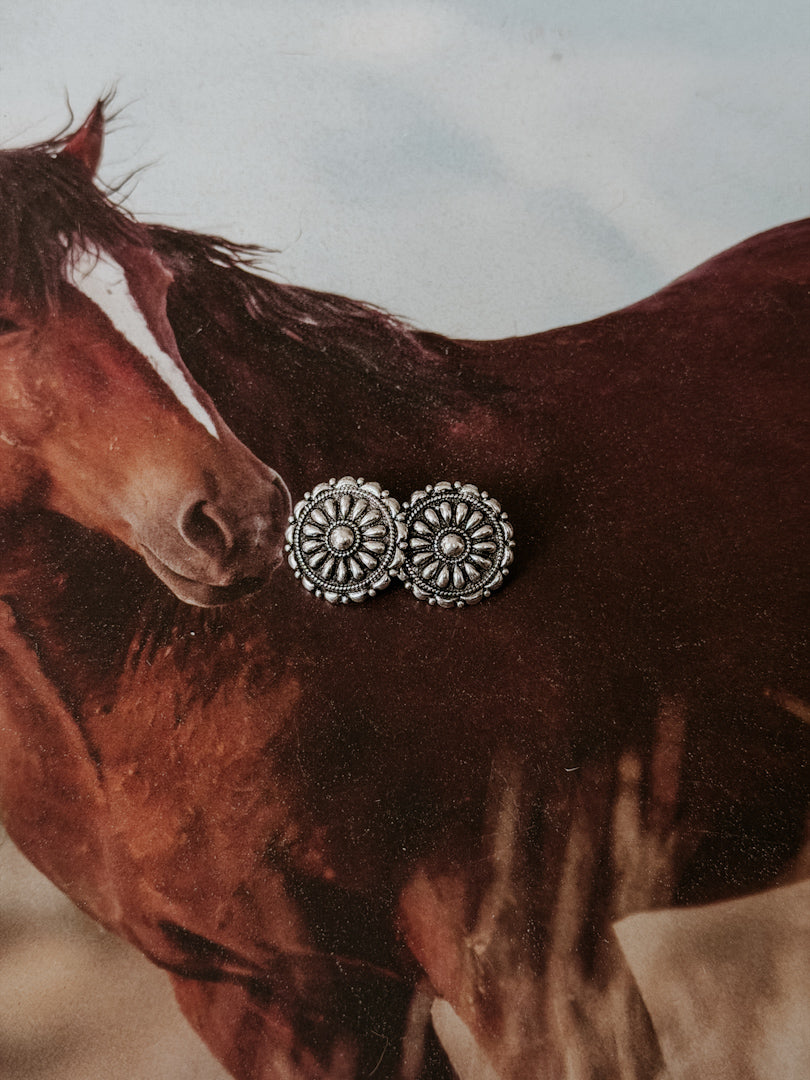 Western concho stud earrings with floral design on a horse background, boho jewelry style