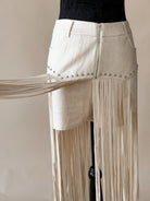 Thunderbird pendant chain necklace displayed on wooden slab with serape fabric underneath - The Wild J