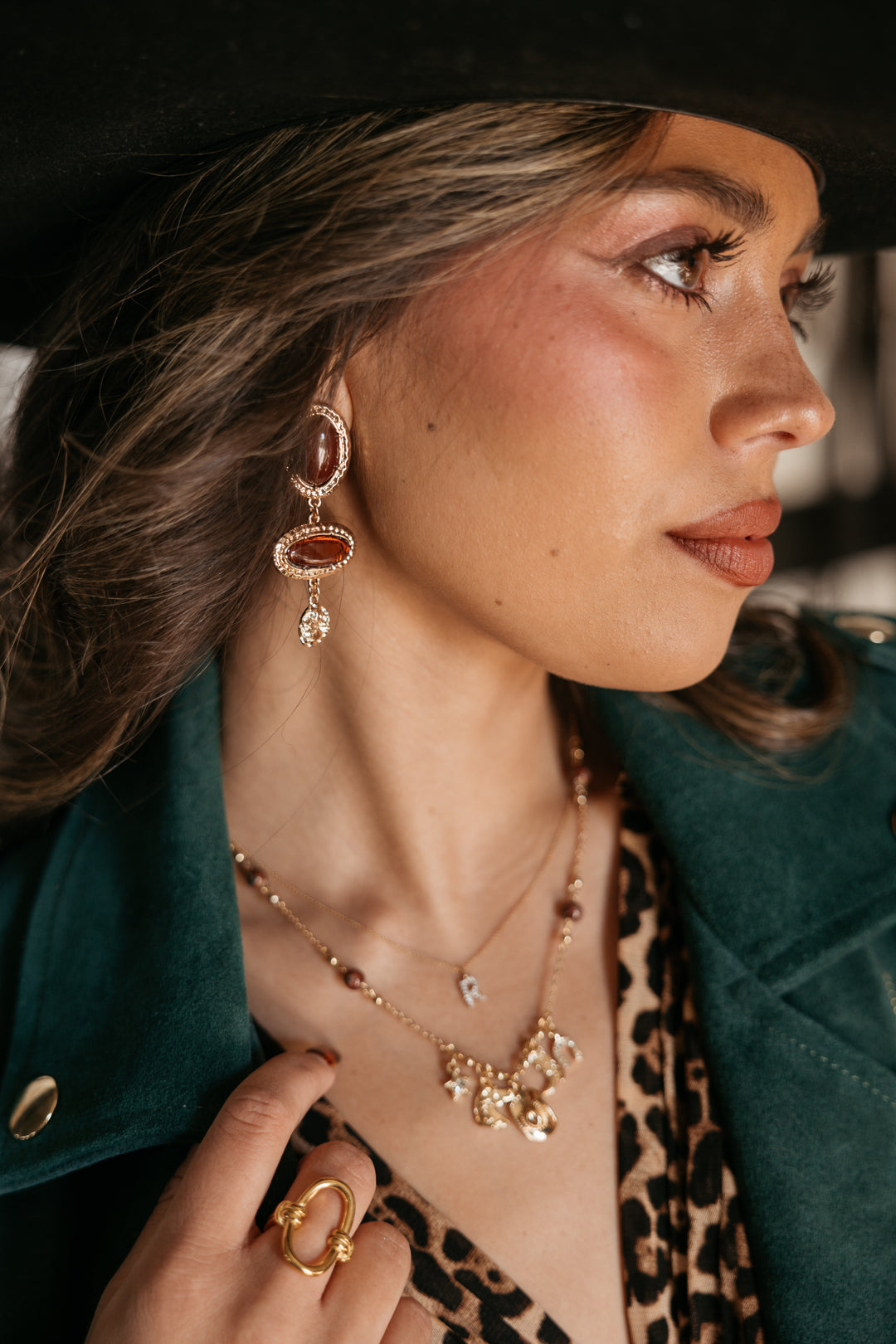 Bold dangle earrings with amber stones and clear stone set in gold