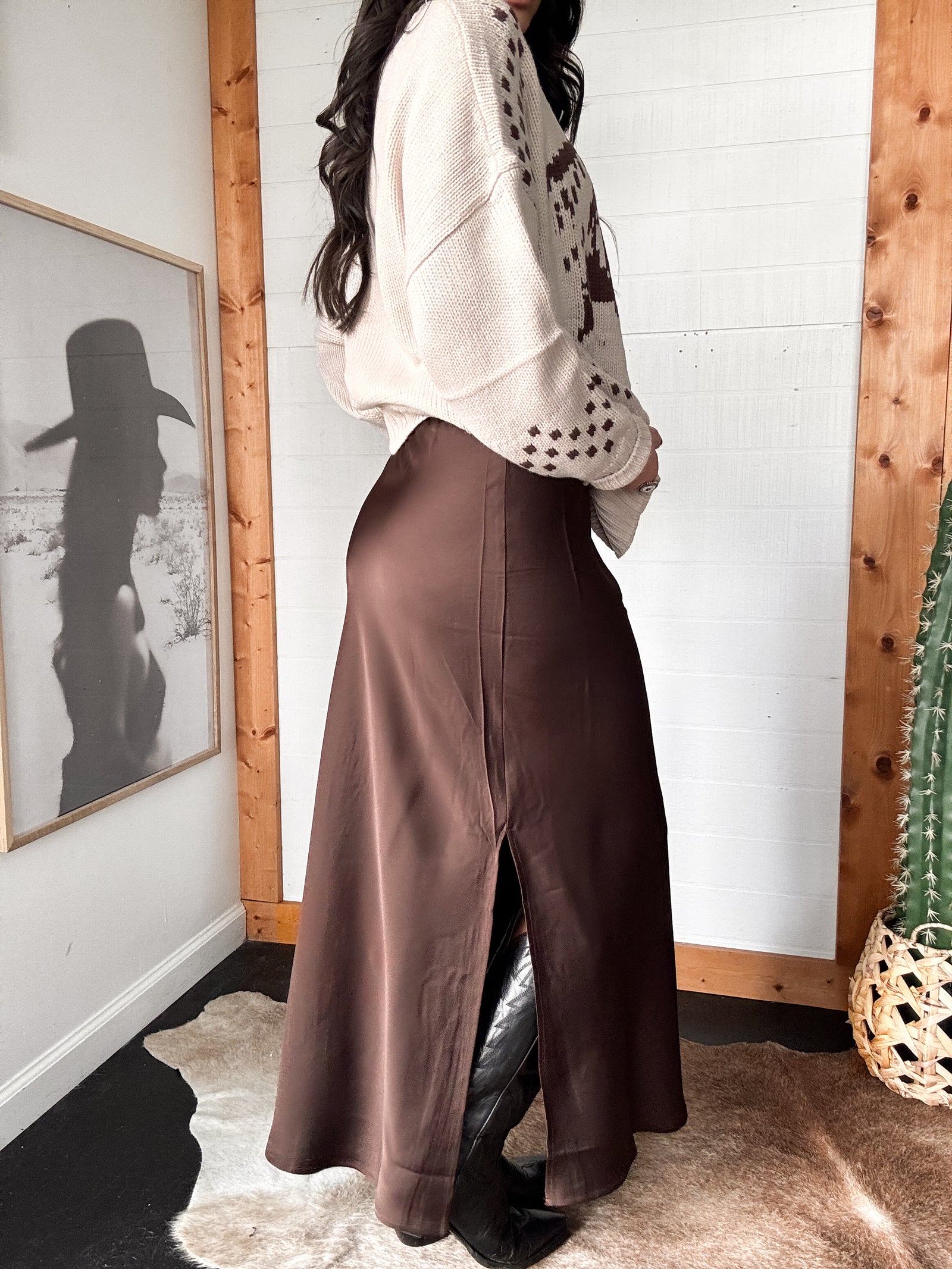 Satin maxi skirt showing side slit detail