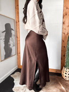Satin maxi skirt showing side slit detail