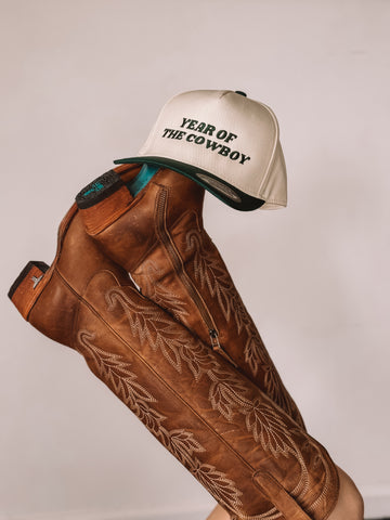 Cream women’s trucker hat with ‘Year Of The Cowboy’ embroidery