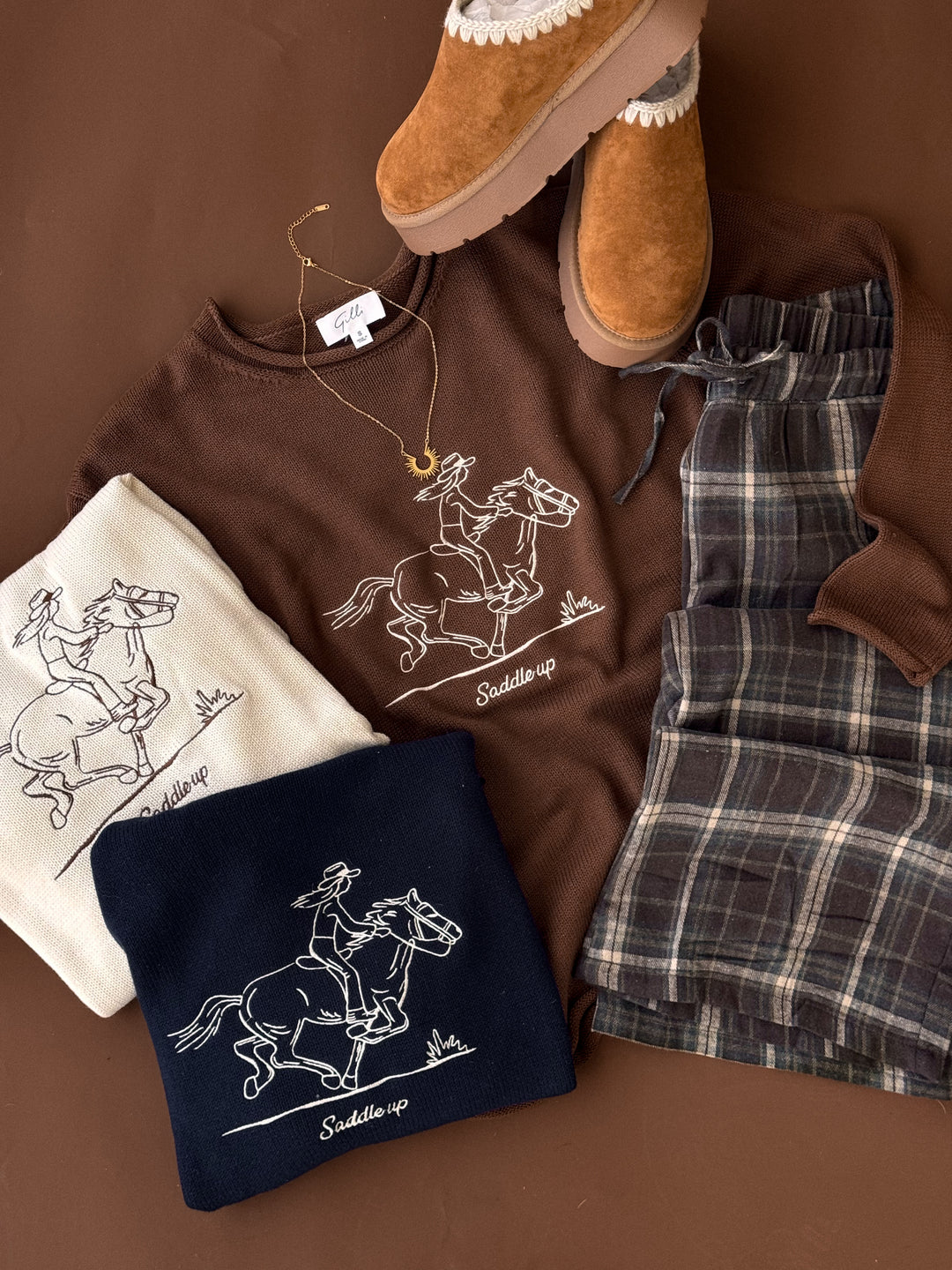 Dark brown plaid wide-leg pajama pants shown folded