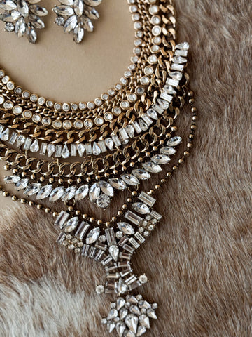 layered western boho necklace with crystal stones and gold chains
