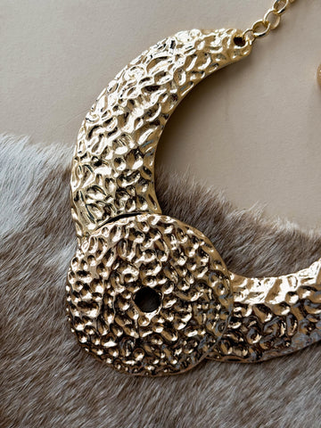 Hammered gold statement necklace with sculptural panel and chain