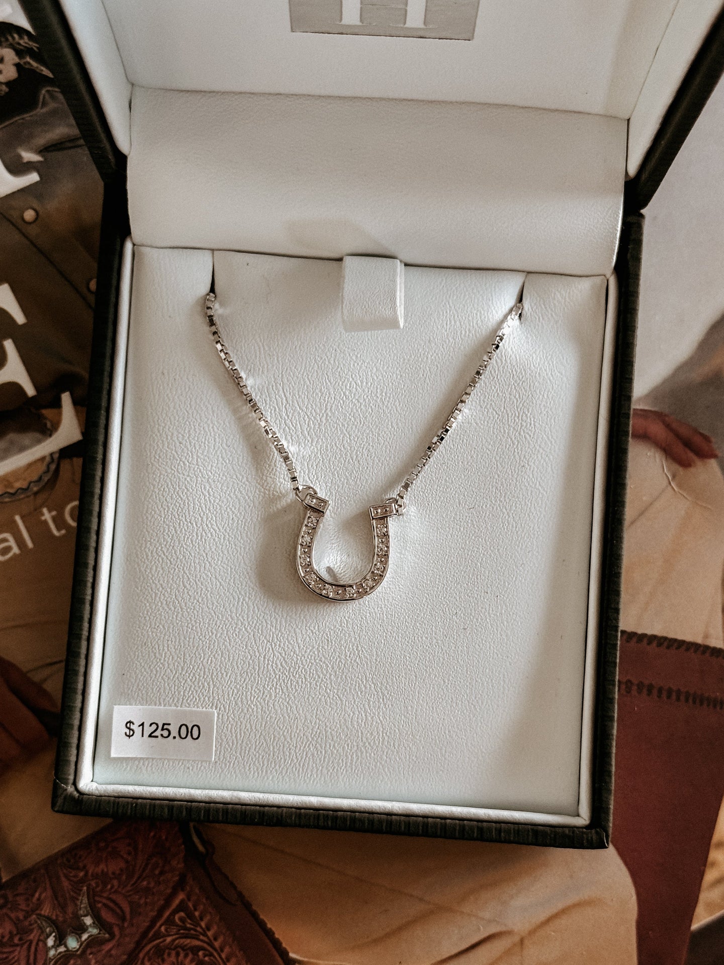 Western-inspired pavé horseshoe pendant necklace