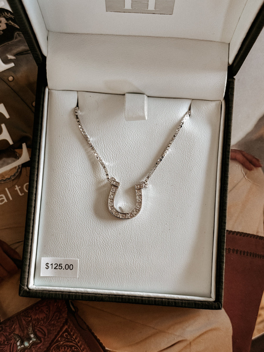 Western-inspired pavé horseshoe pendant necklace