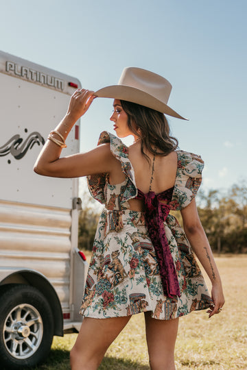 Back-tie velvet ribbon detail on mini dress