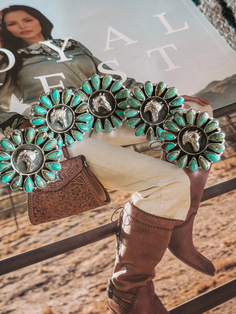 Sterling silver horse rings with turquoise stones in a western boho style setting.