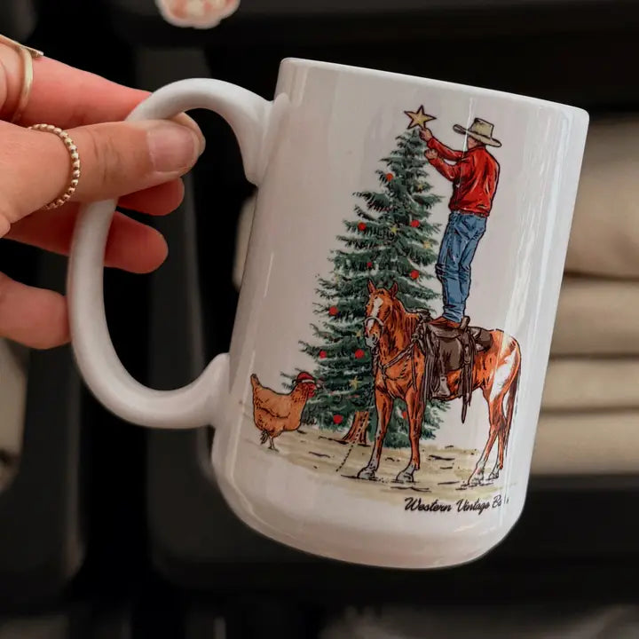 Cowboy Christmas ceramic mug with cowboy trimming tree illustration